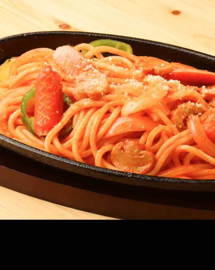 Napolitan served on a hot iron plate